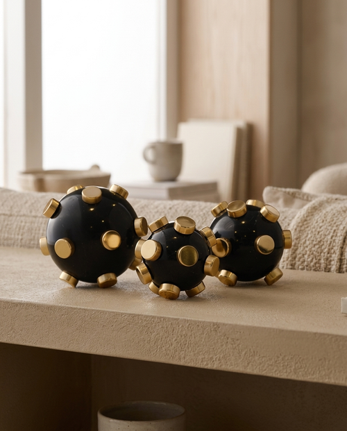 Black Gold Marble Stud Sphere Trio - styled warm beige console scene