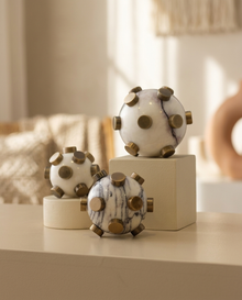 Marble Mine Sphere Decor with Brass Accents - styled warm beige console scene