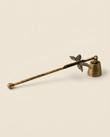 Candle Snuffer - warm ivory studio hero shot