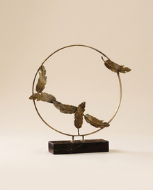 Pile Decor Sculpted Serenity in Brass - warm ivory studio hero shot