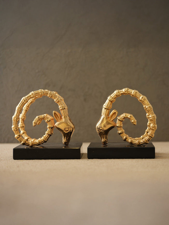 Golden Ram Horn Bookends with Black Marble Base