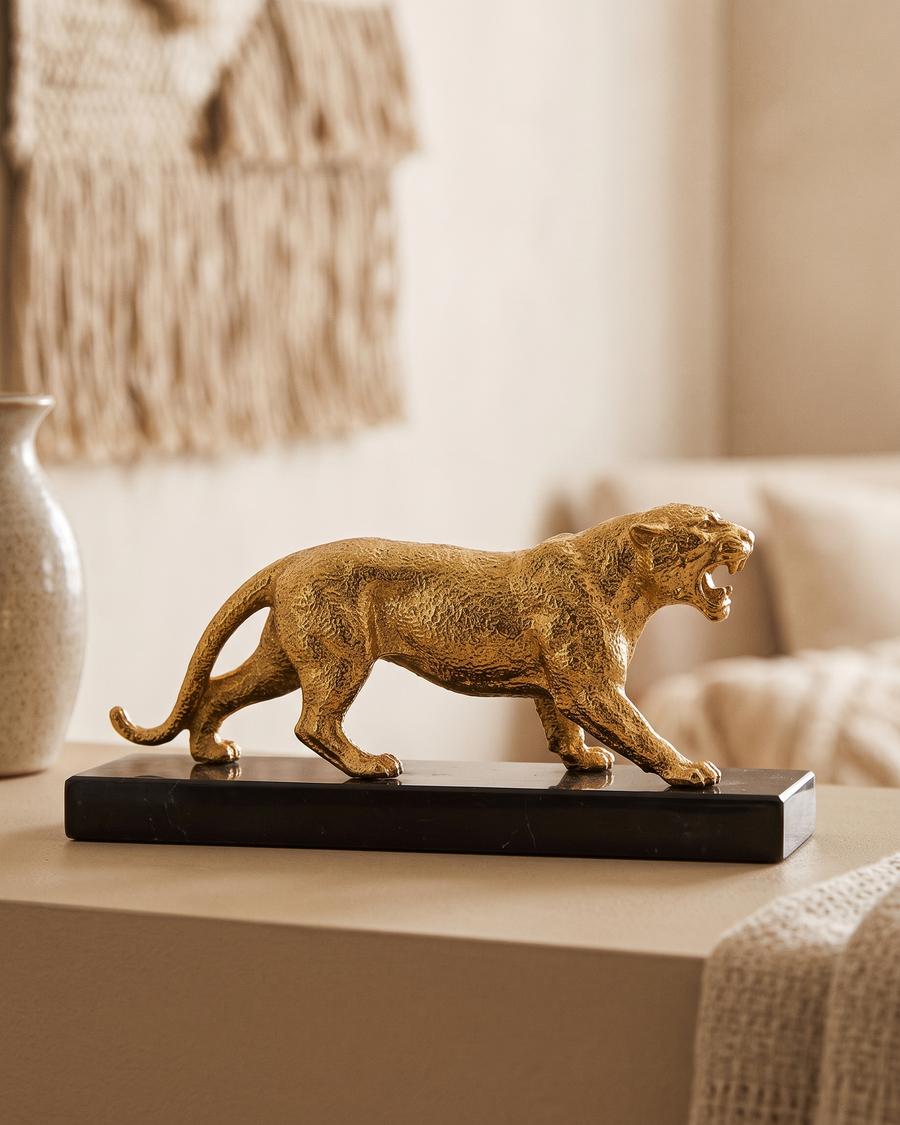 Jaguar Decorative Object II - styled on a warm beige console in a cosy interior