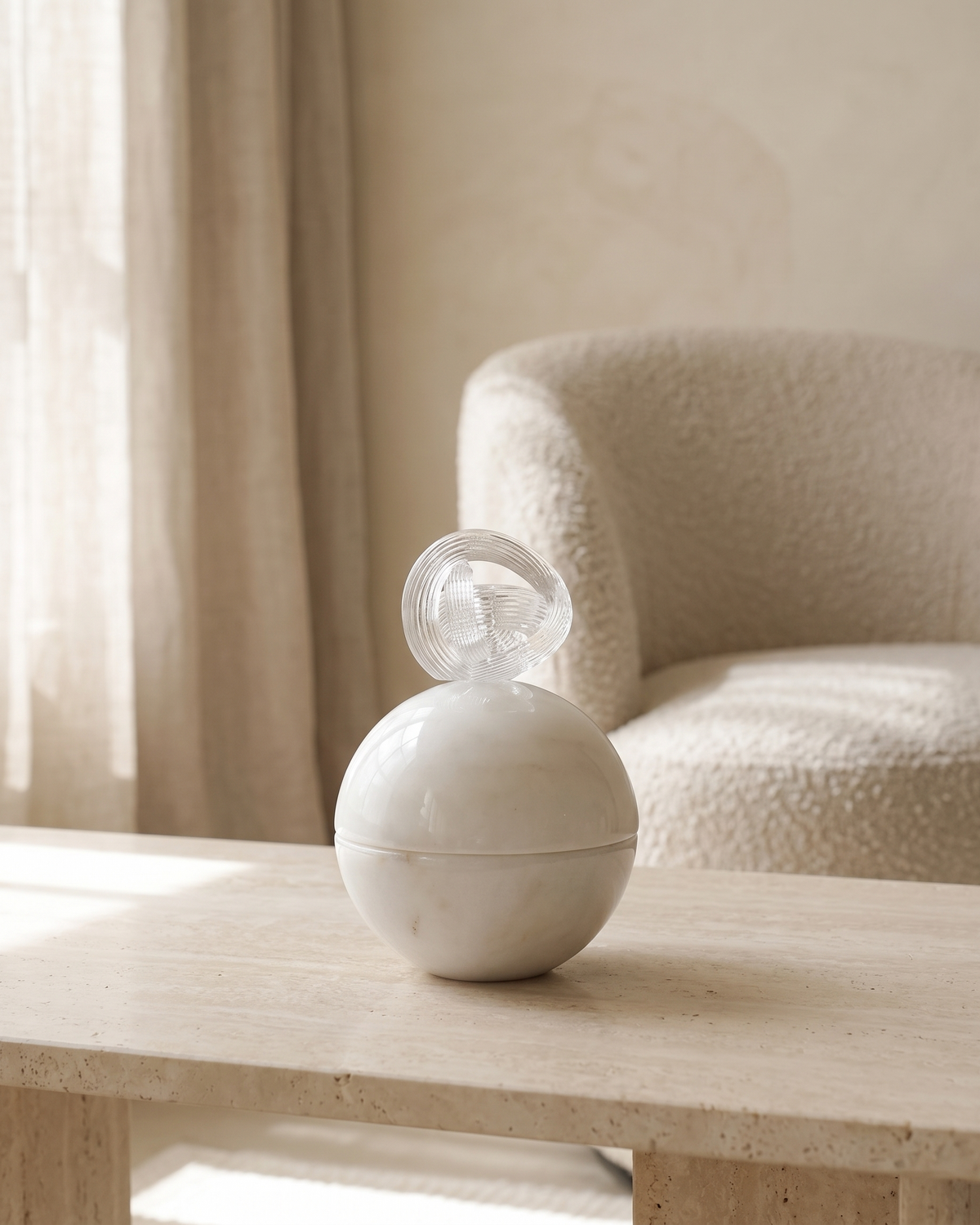 Luna Crystal Loop Marble Bonbonnière - styled on a travertine console in a light interior