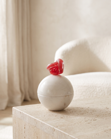 Luna Rouge Crystal Loop Marble Bonbonnière - styled on a travertine console in a light interior
