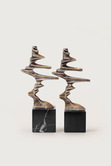 Brass Ribbon Sculpture on Black Marble — Bels & Pearl