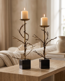 Aged Brass Branch Candle Holder - with lit candles, styled on a warm beige console in a cosy interior