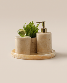 Round Beige Marble Bathroom Set with Crystal Knob (Set of 4) on a warm ivory studio background