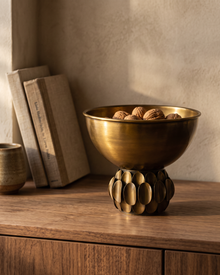 Sequined Brass Bowl styled in a warm interior setting