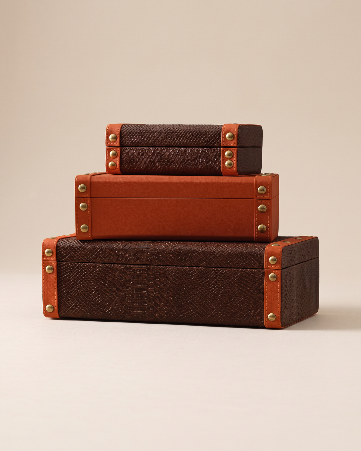 Studded Leather Boxes (Set of 3) on a warm ivory studio background