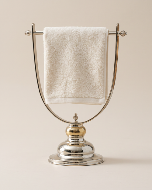 Arched Brass Towel Holder (One Piece) on a warm ivory studio background