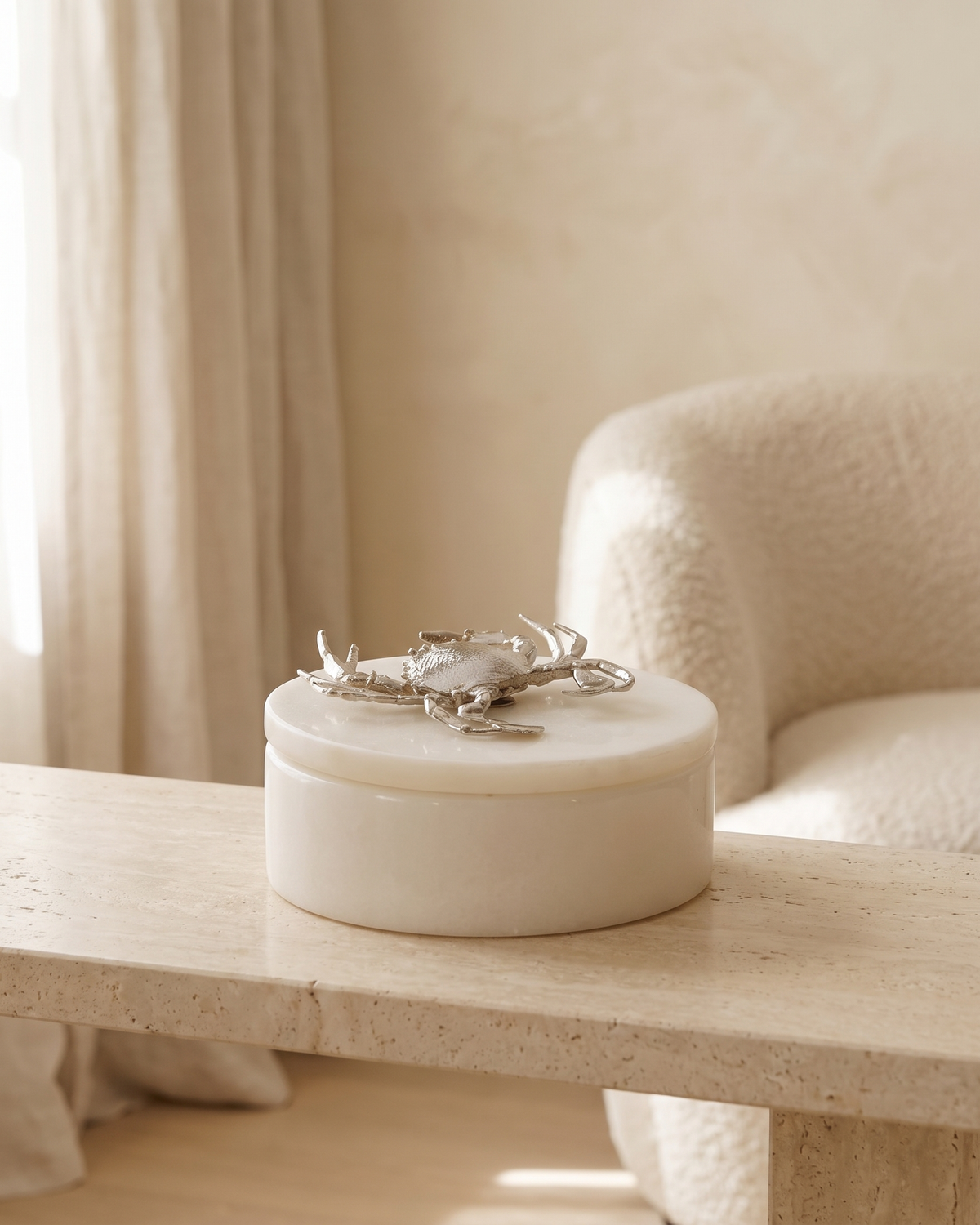 Silver Crab Marble Box with Brass Crab Sculpture - styled on a travertine console in a light interior