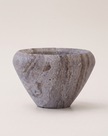 Silver Travertine Balloon Bowl on a pale ivory studio background