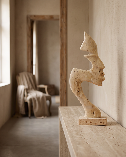 Abstract Face Travertine Sculpture (One Piece) styled in a warm interior