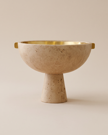 Travertine Pedestal Bowl with Brass Handles (One Piece) on a warm ivory studio background