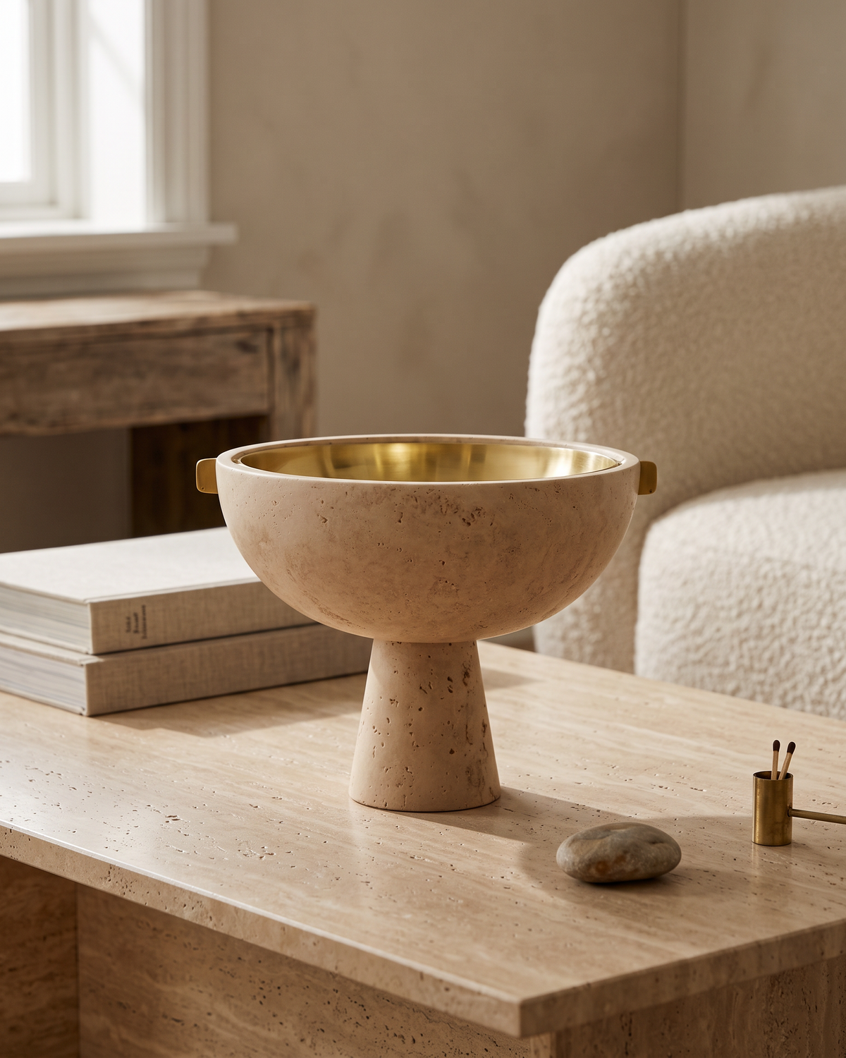 Travertine Pedestal Bowl with Brass Handles (One Piece) styled in a warm interior