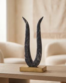 Tulip Decorative Object II - styled on a warm beige console in a cosy interior