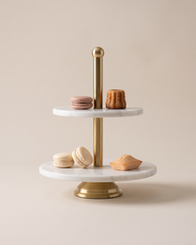 Two-Tier White Marble Serving Stand, Gold (One Piece) on a warm ivory studio background