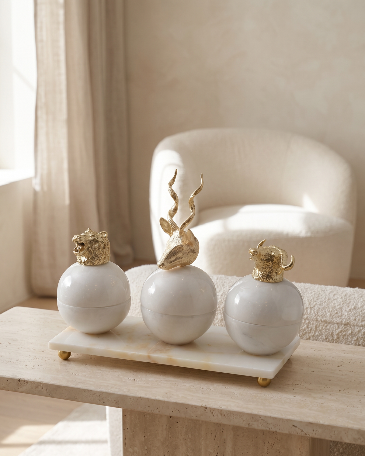 Sculptural Marble Box Set with Brass Animal Lids & Display Tray - styled on a travertine console in a light interior