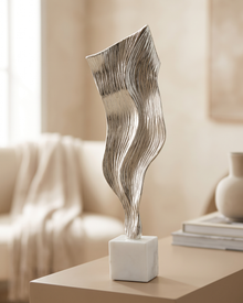 Wind Decorative Object II - styled on a warm beige console in a cosy interior